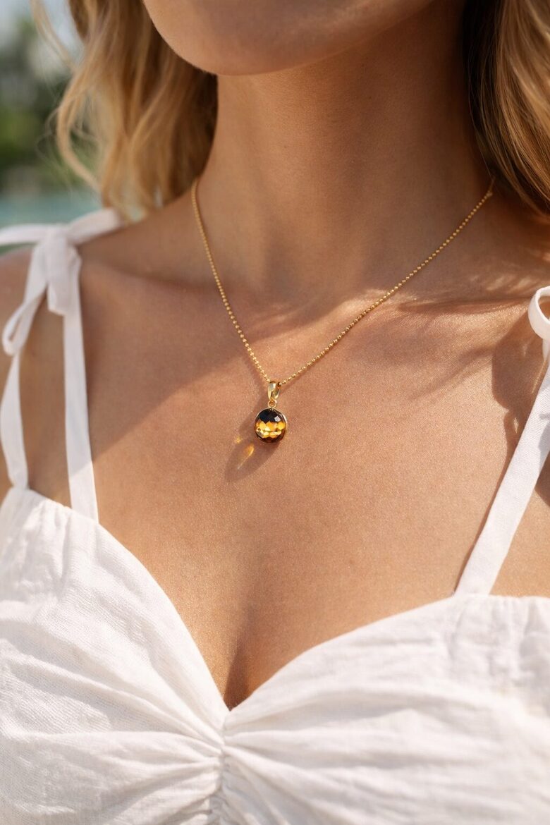 Green Faceted Baltic Amber Pendant “Drop of Light”