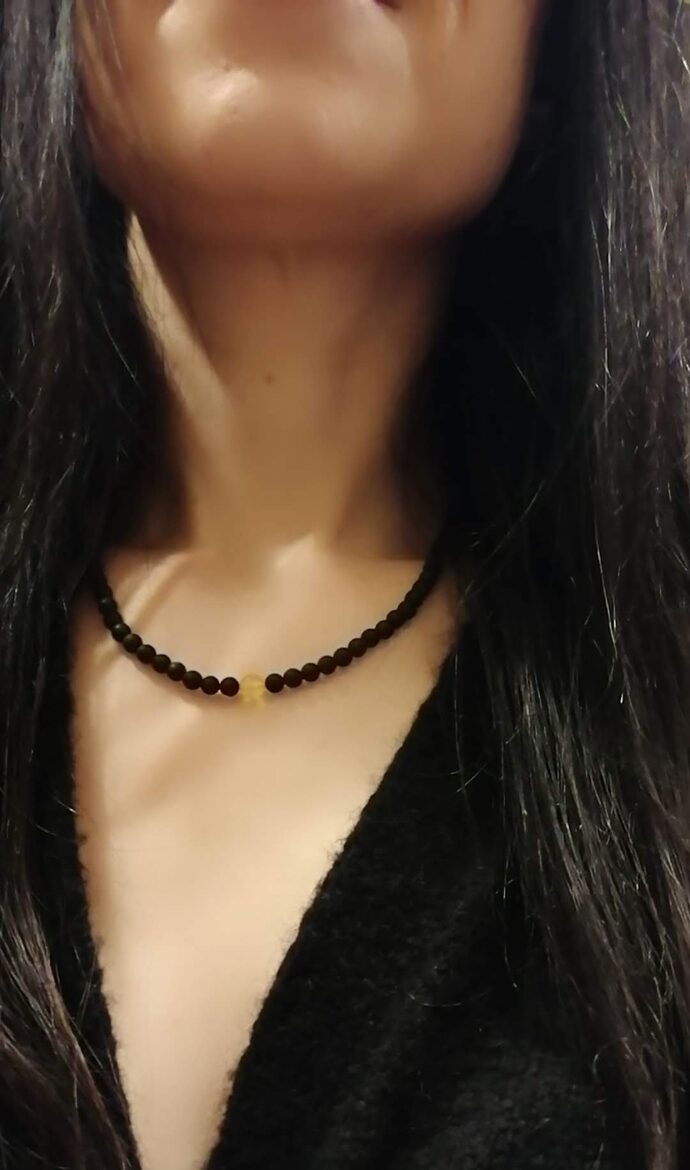 Black Amber Necklace with Clear Faceted Bead Accent