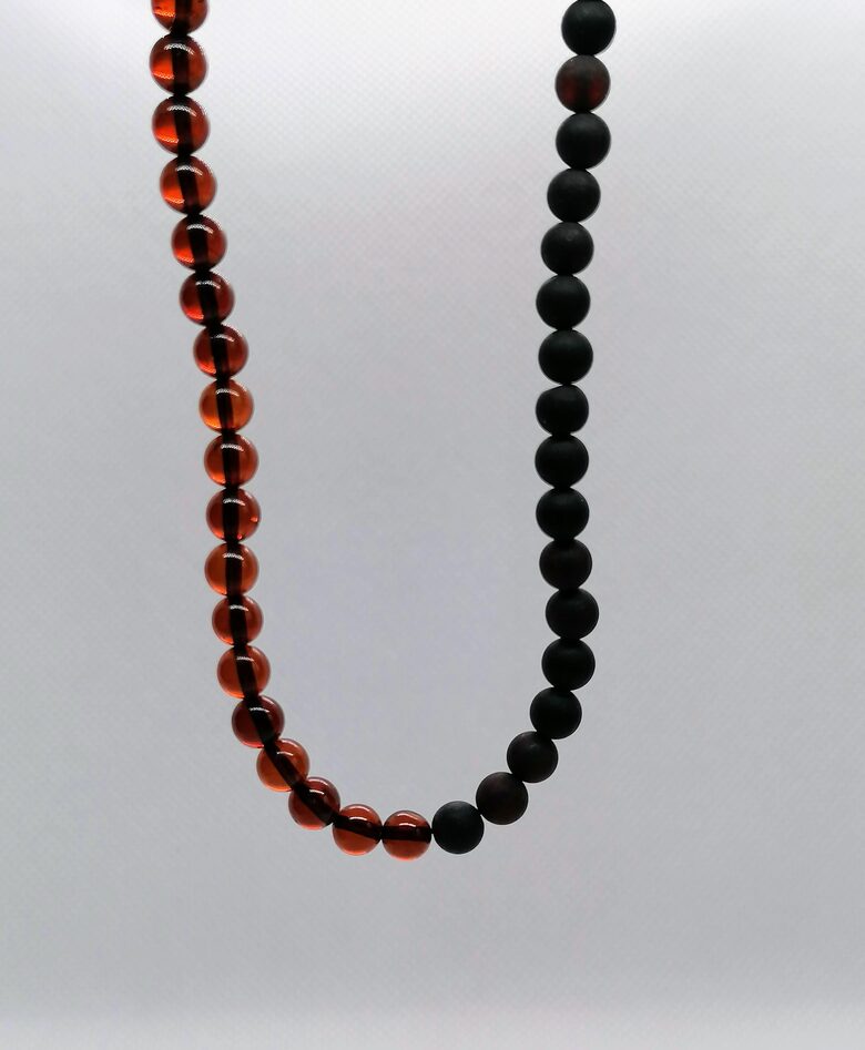 Asymmetrical Baltic Amber Necklace in Matte Black and Cherry Tones