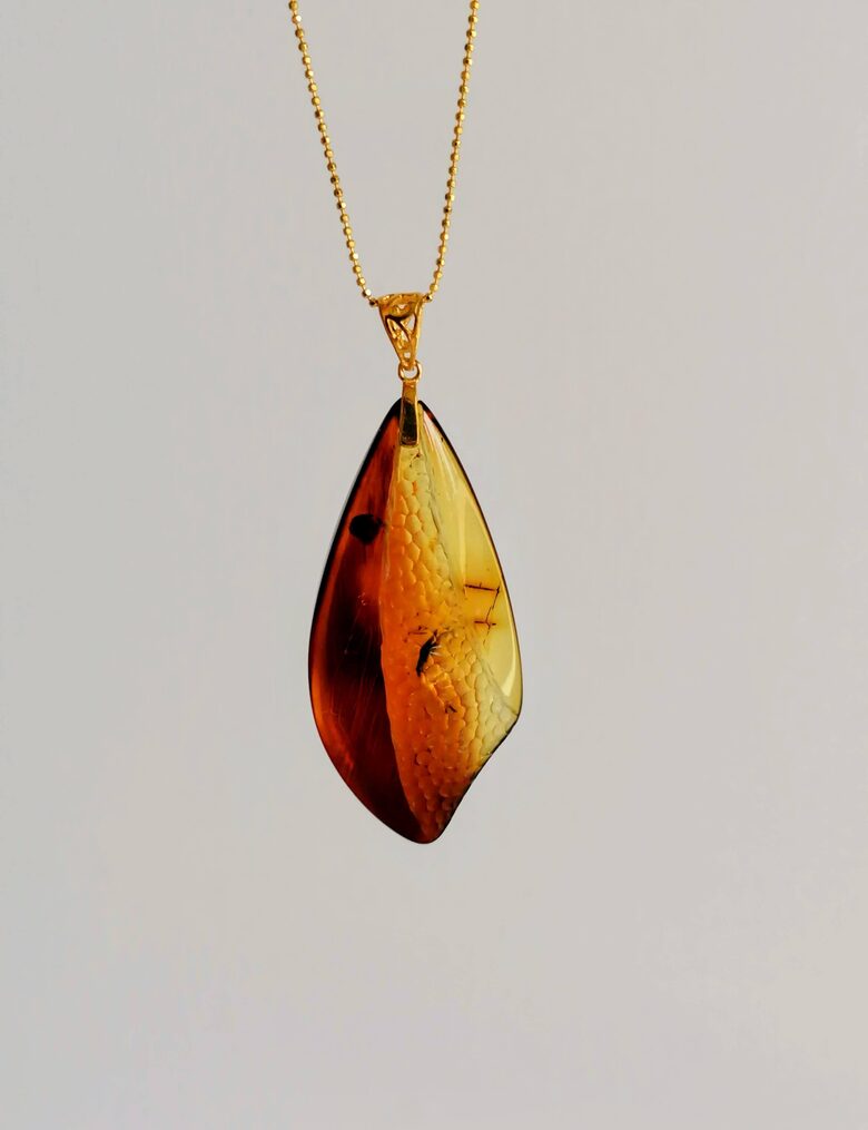 Engraved Amber Pendant “Flame” – Gradient Cognac Tones