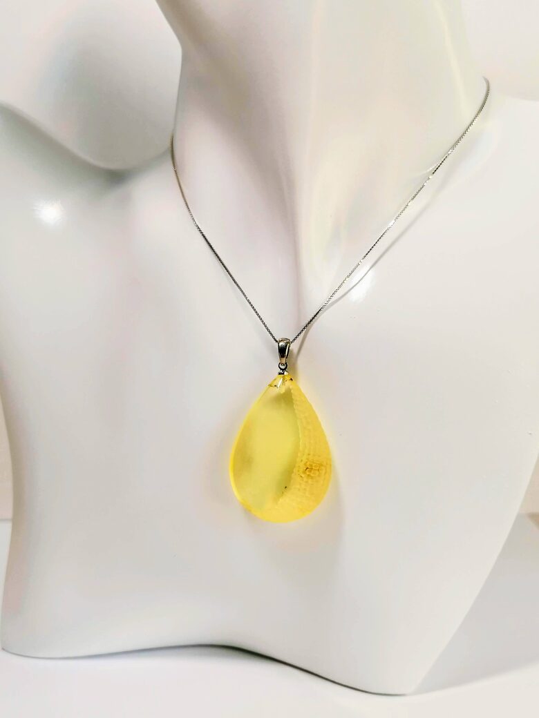 Teardrop Amber Pendant with Cloud Inclusion and Stipple Engraving